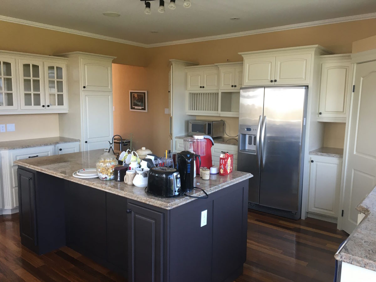 Refinished kitchen cabinets by kitchen cabinet painters the Spray Shop